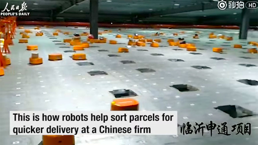 Se hur kineserna sorterar sina paket med en robotarmé